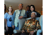 GAYLE FERRARO, MUHAMMAD YUNUS, LAMIYA MORSHED, NELSON MANDELA AT THE MANDELA CENTER, JOHANNESBURG, FOR MANDELA'S 92ND BIRTHDAY